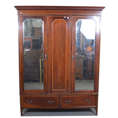 Lot 550 - Edwardian mahogany triple wardrobe