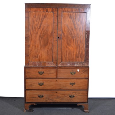 Lot 607 - George III mahogany press cupboard