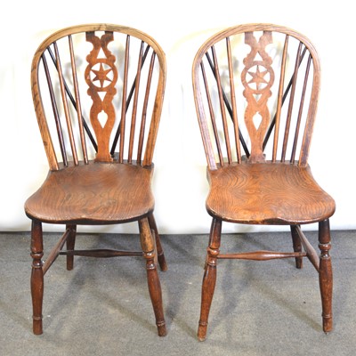 Lot 489 - Pair of Victorian elm and ash star back Windsor kitchen chairs