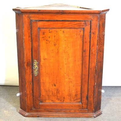 Lot 516 - Georgian fruitwood hanging corner cupboard.