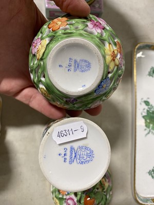 Lot 87 - Two Herend, Hungary, hand-painted porcelain pierced vases.