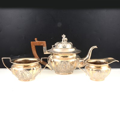 Lot 297 - Anglo-Indian three-piece white metal teaset.