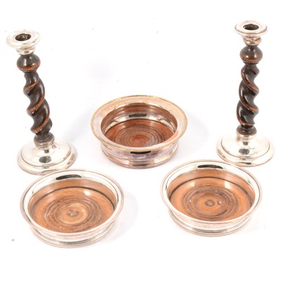 Lot 254 - Pair of oak and silver barleytwist candlesticks and three coasters