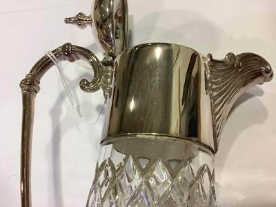 Lot 248 - Cut glass claret jug and a silver plated claret jug