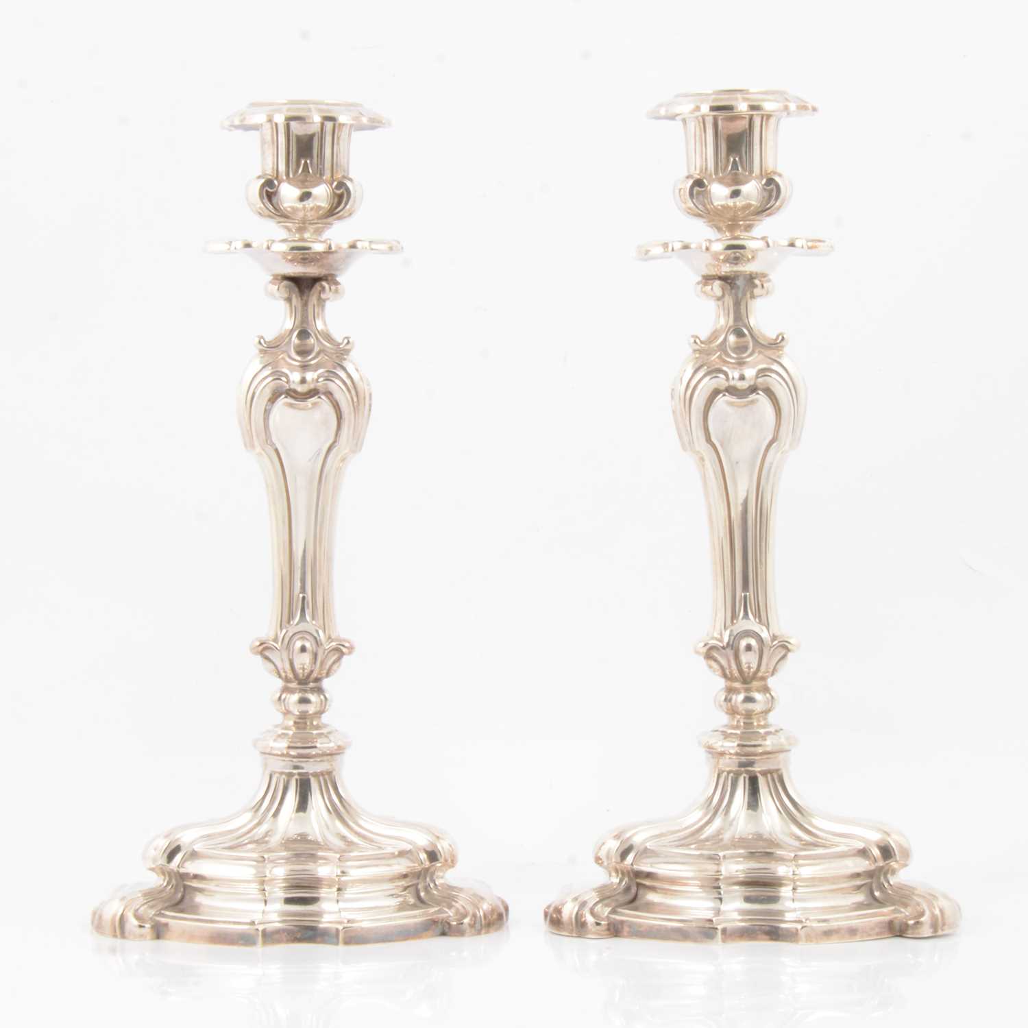 Lot 246 Pair of French silver candlesticks by