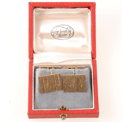 Lot 311 - Pair of 1960's 9 carat gold bark textured cufflinks. and a tie stud.