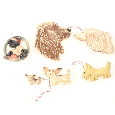 Lot 331 - Twelve novelty Scottie dog and other terrier brooches, in a golf bag, playing tennis.