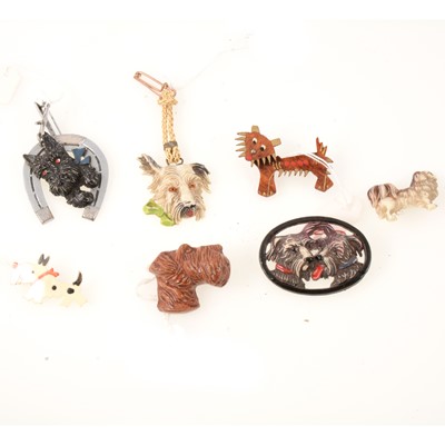 Lot 329 - Twenty vintage novelty dog brooches, pins and clips, celluloid, metal, composite