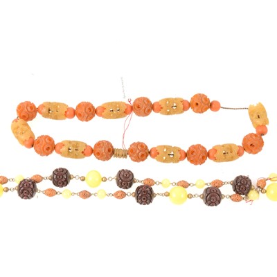 Lot 344 - Bakelite and glass bead necklace and a French carved necklace.