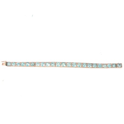 Lot 347 - Heat treated blue zircon bracelet testing as silver with vintage bracelet box.