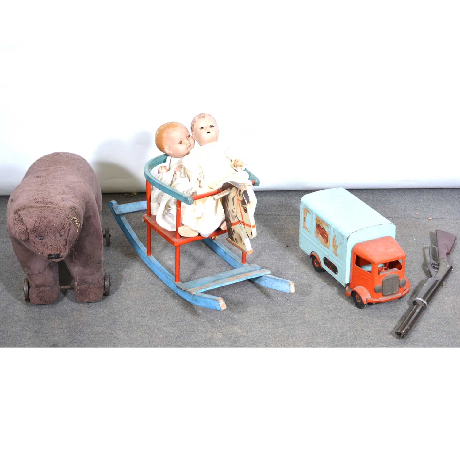 Lot 120 - Vintage toys including a ride-on growling bear, Tri-ang Transport van, dolls etc