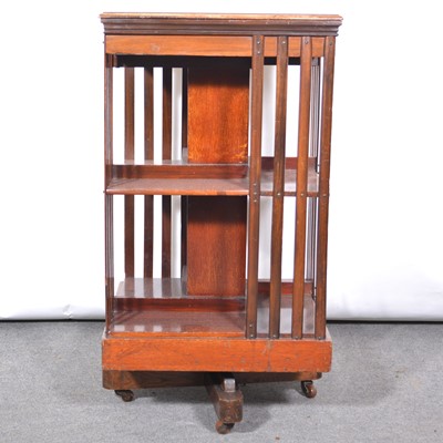 Lot 524 - Edwardian inlaid mahogany revolving bookcase.