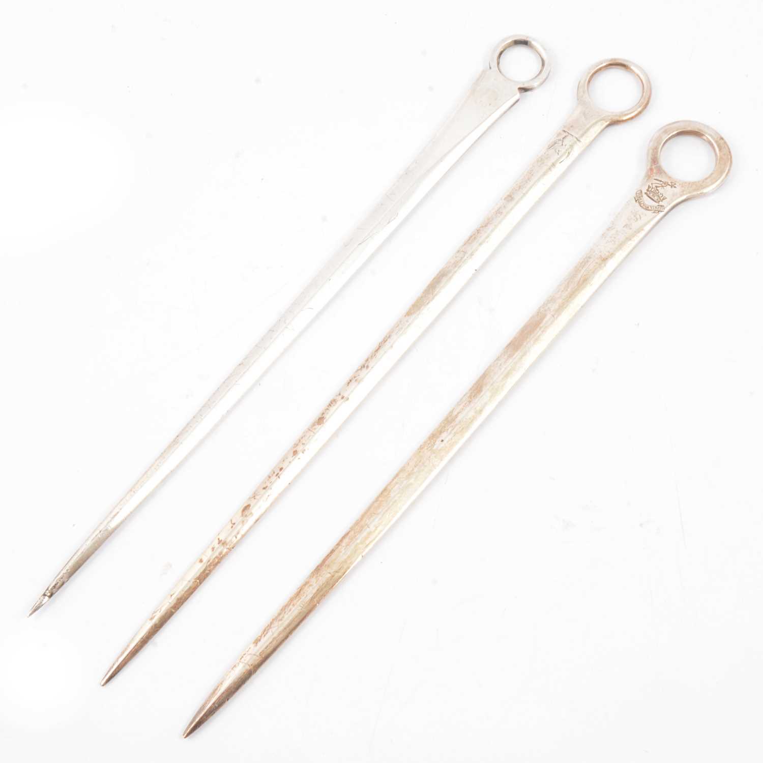 Lot 213 - Three silver meat/game skewers, London, 25cm.