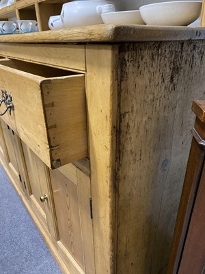 Lot 553 - Large pine kitchen dresser, with rack.