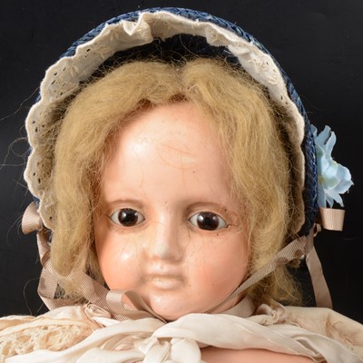 Lot 351 - A large wax over composition doll