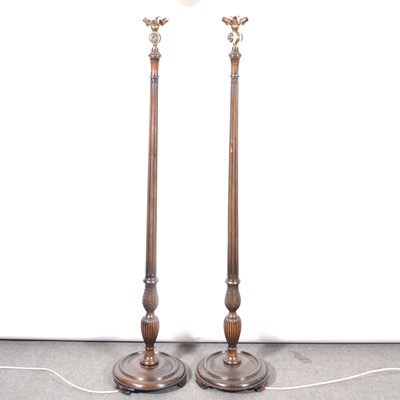 Lot 501 - Pair of walnut standard lamps