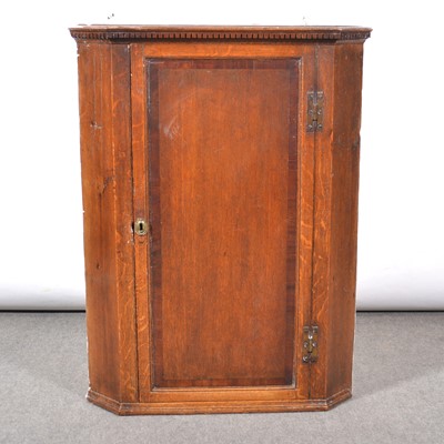 Lot 442 - George III oak hanging corner cupboard