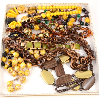 Lot 335 - Vintage bead jewellery in yellows and browns, matching suites.