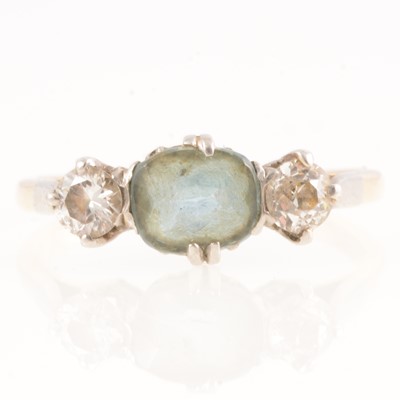 Lot 214 - Aquamarine and diamond three stone ring