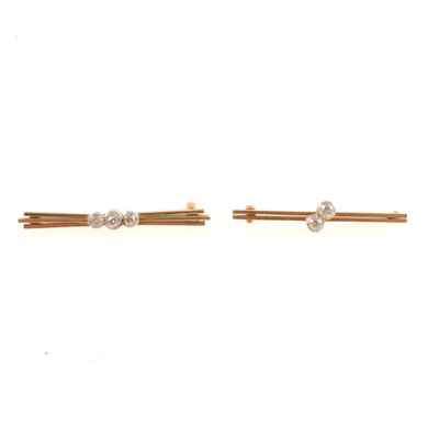 Lot 231 - Two diamond set bar brooches.