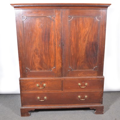 Lot 387 - George III mahogany linen press