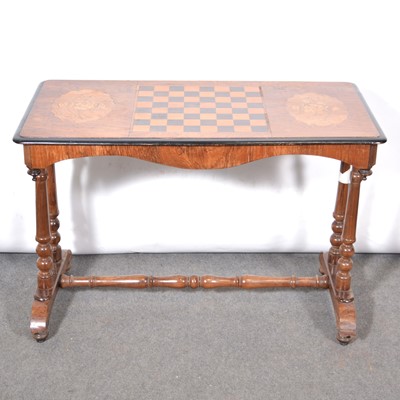 Lot 428 - Victorian walnut games table