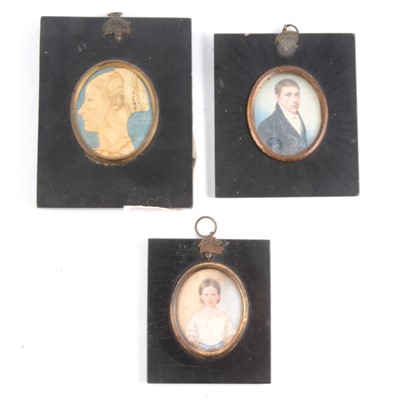 Lot 110 - Three portrait miniatures including a follower of Buck.