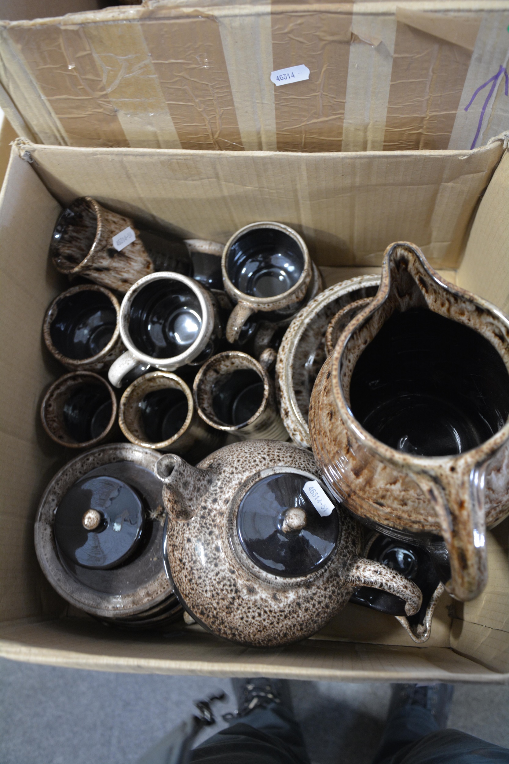 Lot 64 Fosters brown and treacleglazed tea sets.