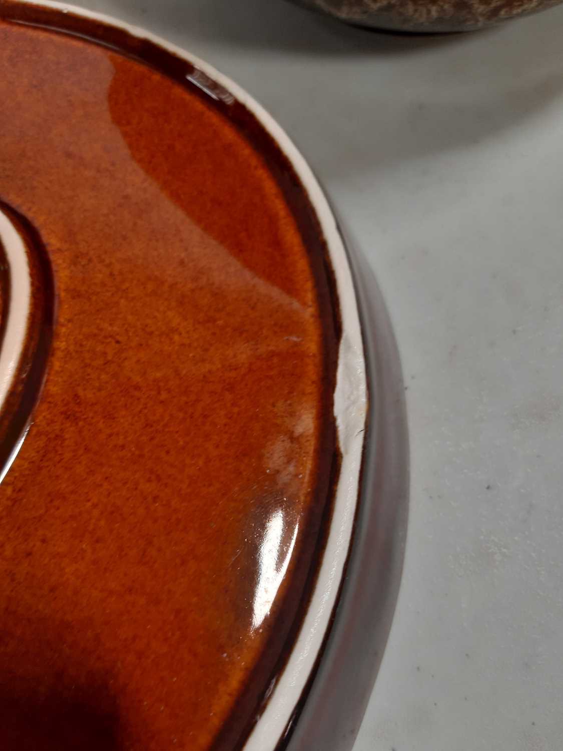 Lot 64 Fosters brown and treacleglazed tea sets.