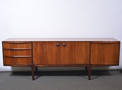Lot 1069 - Rosewood 'Torpedo' sideboard, designed by Tom Robertson for McIntosh of Kirkcaldy, 1970s.
