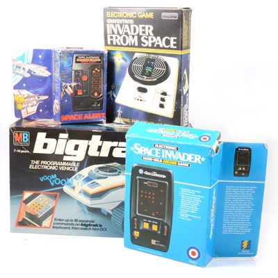 Lot 297 - Four electronic games and toys