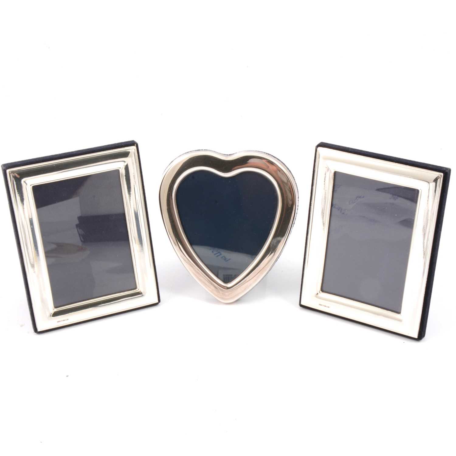 Lot 192 - Carr's of Sheffield, silver heart shaped photograph frame and two others, new and boxed.