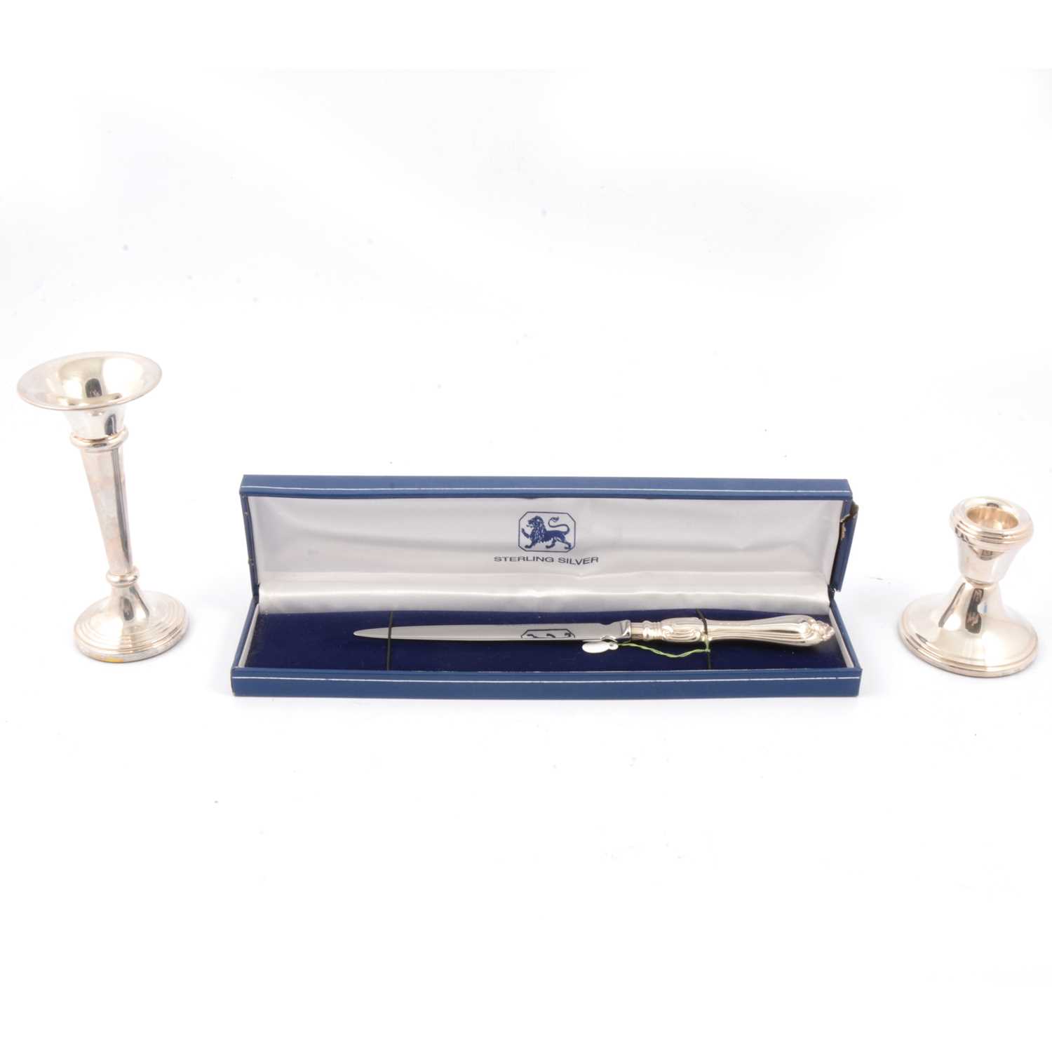 Lot 193 - Broadway & Co, a silver bud vase, candlestick and letter opener, all new and boxed.