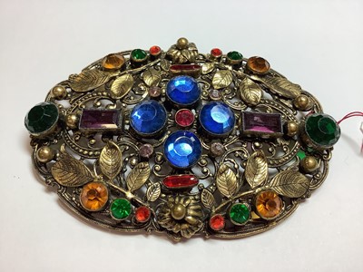 Lot 275 - Three large 1930's filigree brooches with coloured paste gems, Czechoslovakian.