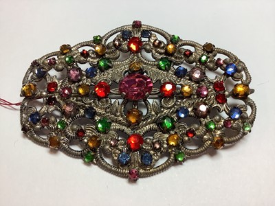 Lot 275 - Three large 1930's filigree brooches with coloured paste gems, Czechoslovakian.