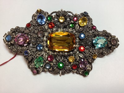 Lot 275 - Three large 1930's filigree brooches with coloured paste gems, Czechoslovakian.