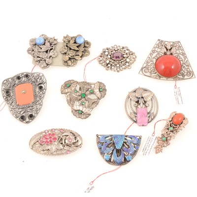 Lot 272 - Ten vintage white metal dress clips and brooches, faux coral, enamel, French and others.