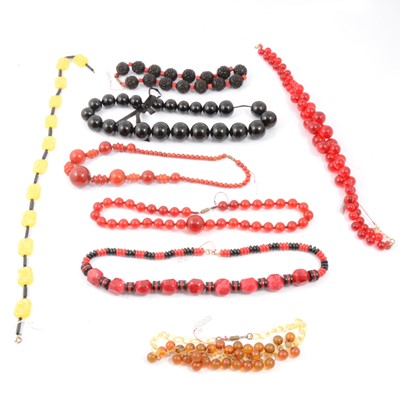 Lot 319 - Eight vintage coloured bead necklaces, Agatha Paris, 1930's bakelite. carved wooden beads