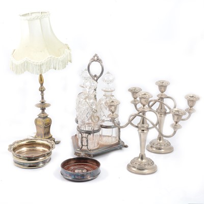 Lot 156 - An electroplated three bottle Tantalus, etc.