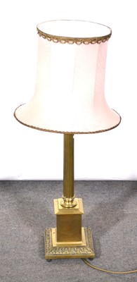 Lot 483 - A brass and copper mounted table lamp