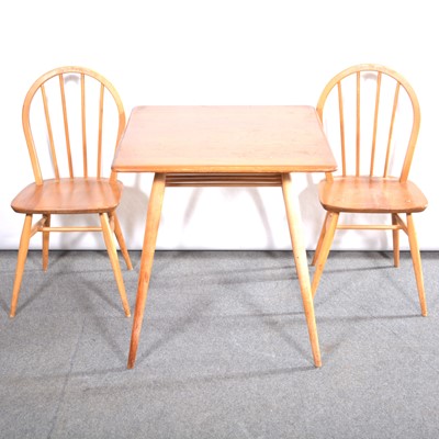 Lot 474 - Ercol kitchen table and two chairs