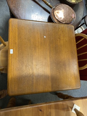 Lot 474 - Ercol kitchen table and two chairs