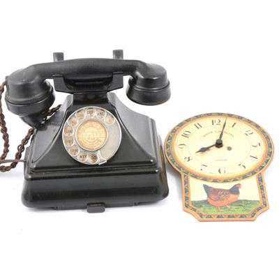 Lot 172 - Vintage black bakelite telephone and a modern clock.