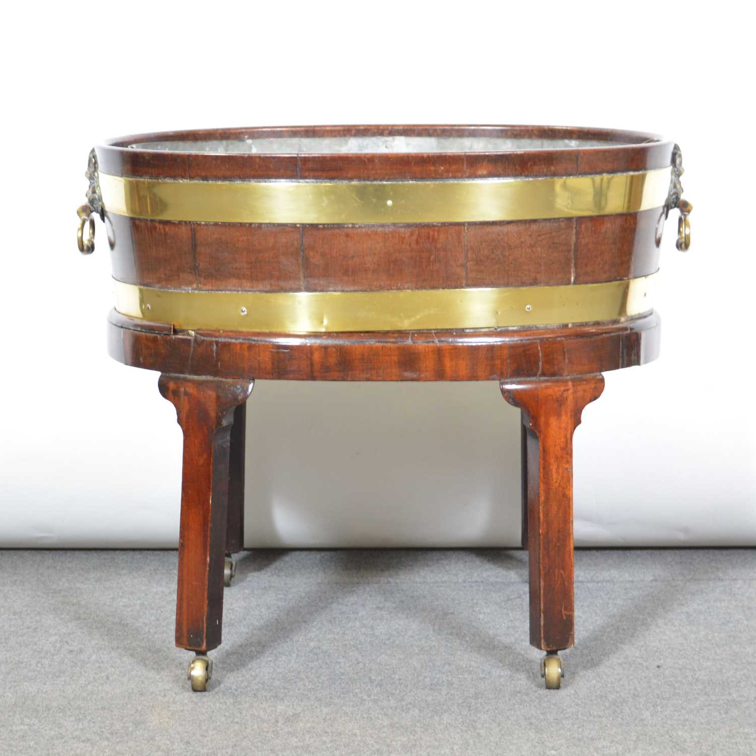 Lot 478 - George III mahogany wine cooler on stand
