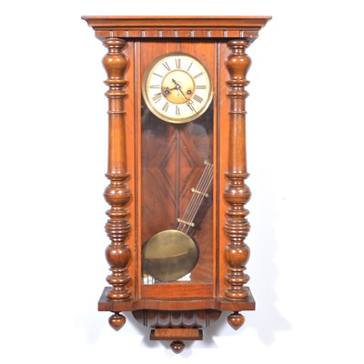 Lot 410 - A walnut and stained beechwood Vienna wall clock