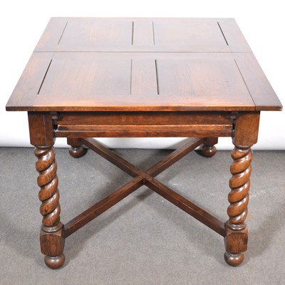 Lot 362 - Oak draw leaf dining table and six chairs