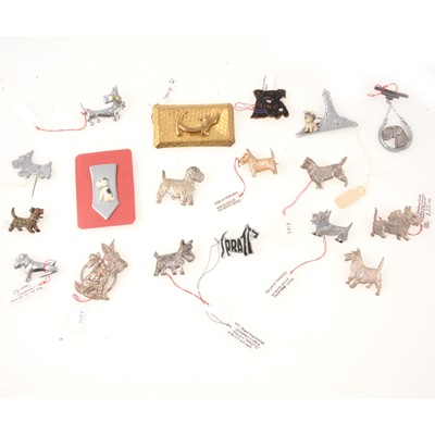 Lot 329 - Eighteen novelty Scottie and other dog brooches and clips, silver, chrome, enamel, one "Spratts"