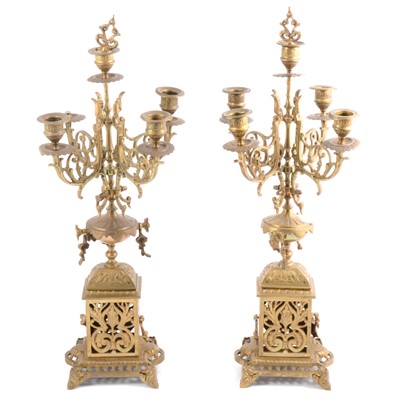 Lot 580 - A pair of four light candelabra.