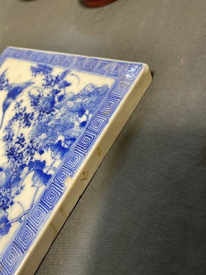 Lot 82 - Four Chinese blue and white tiles.