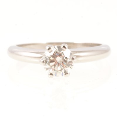 Lot 277 - A diamond solitaire ring, 0.84 carat in platinum.
